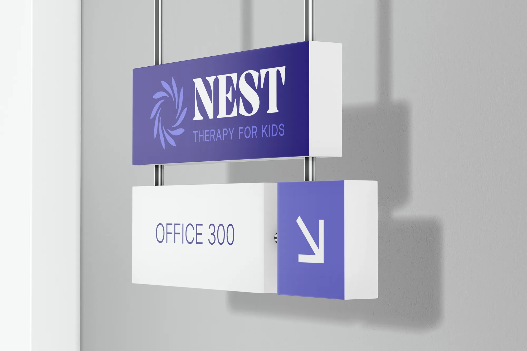 A hanging office sign with the Nest logo in white on Rich Blue, above an 'Office 300' wayfinding panel