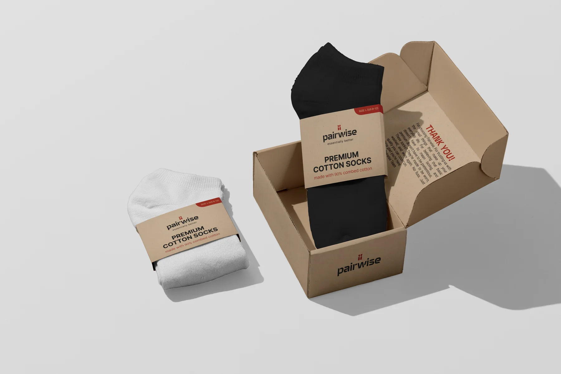An open shipping box with a sleeved sock and a thank-you note printed inside the lid